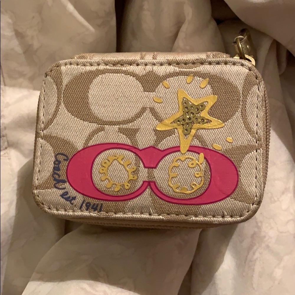 Coach pill case